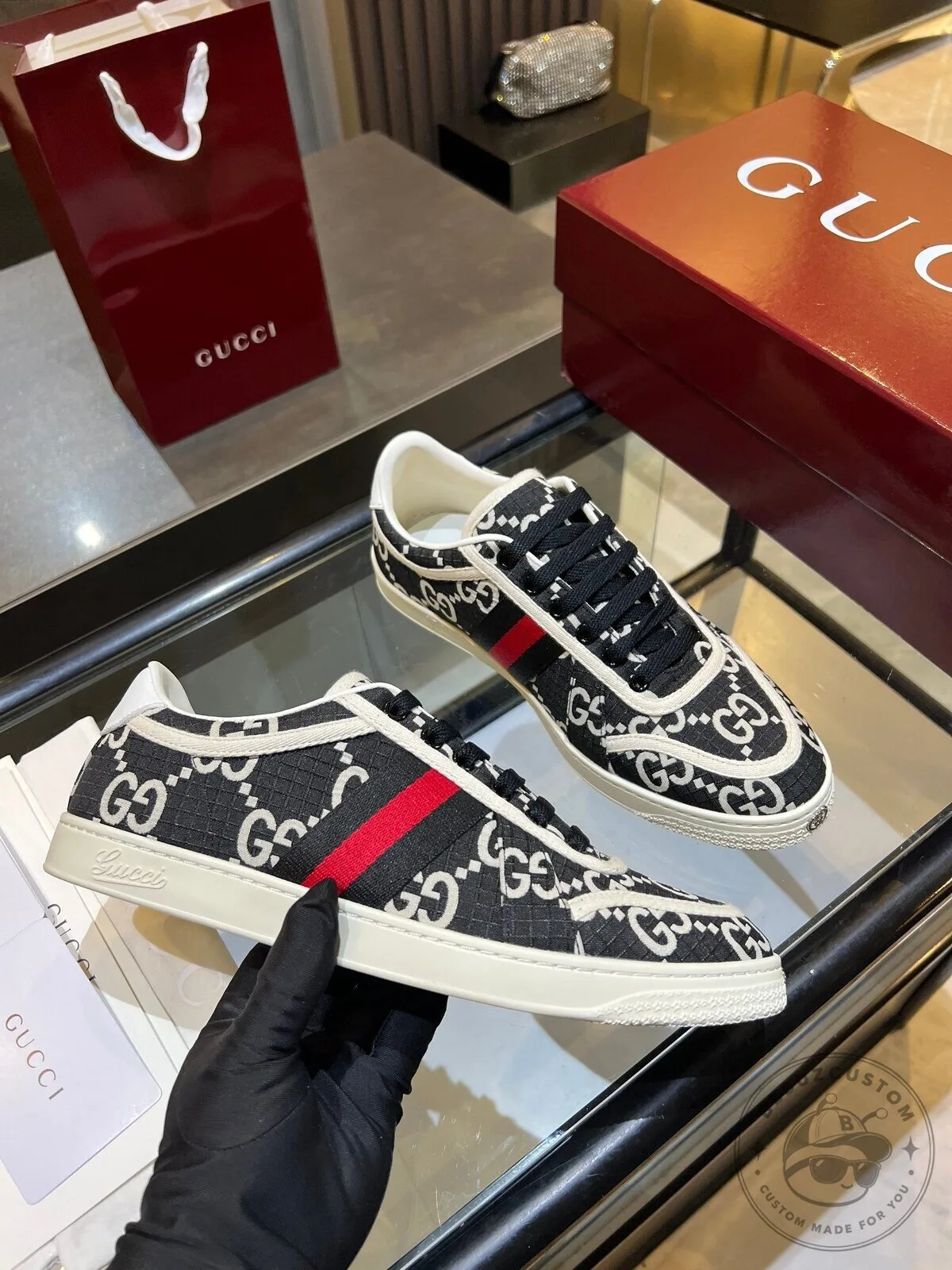 Low Top Sneakers with Red and Green Stripe Detail in Gucci Monogram Canvas
