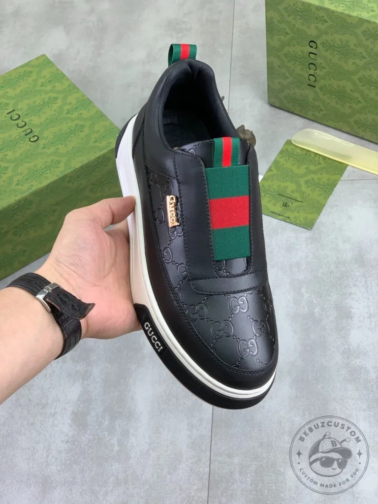 Gucci Black Leather Slip-On Sneakers with Signature Web Stripe Detail